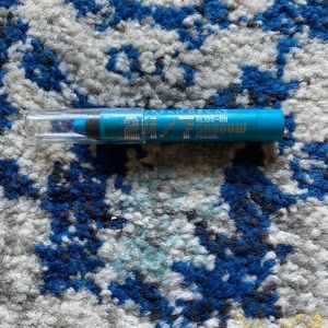 Urban Decay Eyeshadow Pencil. Teal with Silver Glitter. Color is Clash